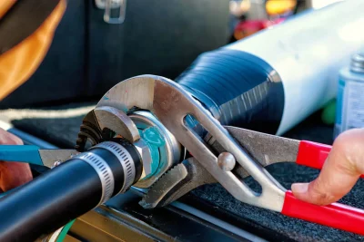 Pipe repair service using professional plumbing tools in Riverview, Florida